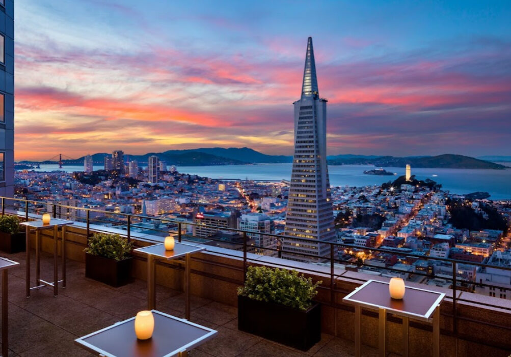 A view of the city from an outdoor restaurant.